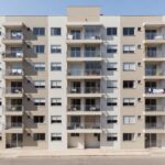 Edifício residencial brasileiro com apartamentos para aluguel e cálculo de imposto de renda