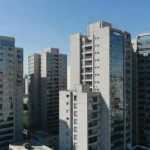 Edifícios residenciais modernos em São Paulo representando análise de yield imobiliário