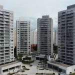 Edifícios residenciais representando carteira de imóveis para cálculo de yield líquido